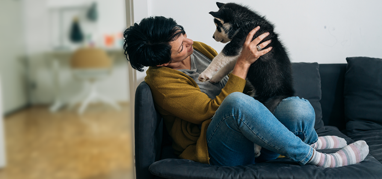 Woman holding puppy